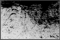 May 20, 1948. Terrace deposits on eroded older Pleistocene deposits in bank of a small tributary, at junction with South Loup River, near the center of 28-12N-15W, Buffalo County, Nebraska. Contact marked by top of spade handle and head of geology hammer.