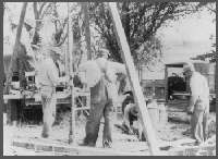 Tripod set up to jet a well.